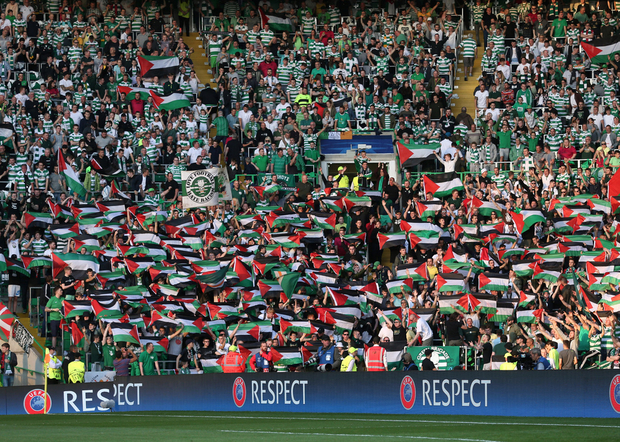Scottish football fans fly flag of Palestine in match against Israeli team