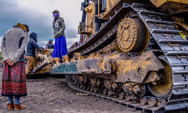 Three Massive Mergers—Millions for One Bank and a Disaster for Food, Water, and Climate