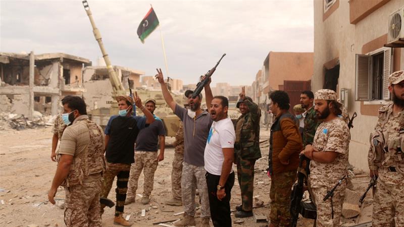 Libyan forces claim control of ISIL stronghold of Sirte