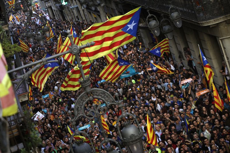 Spain takes over Catalonia, fires defiant separatist leaders