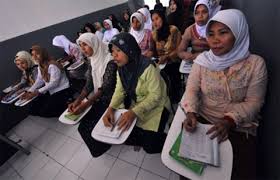 With paper in hand, Indonesian maids fight exploitation