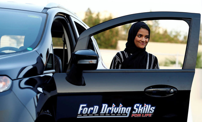 Saudi women take the wheel, test-driving a new freedom