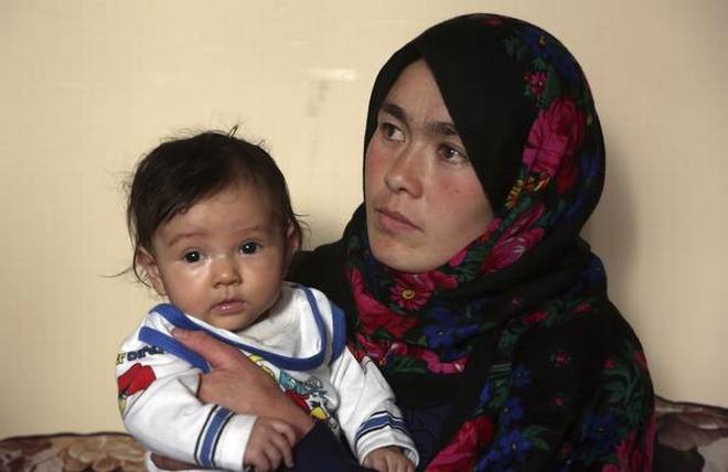 Afghan woman, whose picture went viral, achieves dream of college