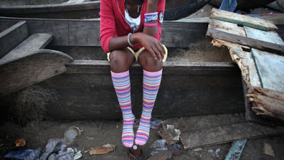 What is breast ironing and how common is it in Britain?