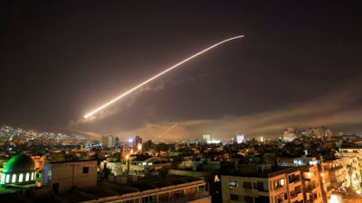 Western powers threaten new attack on Syria