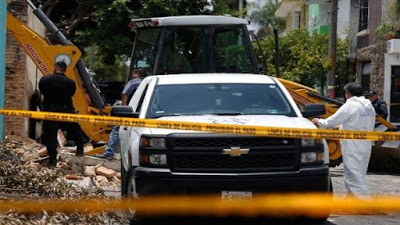Hallan 19 cadáveres en fosa clandestina en Jalisco, México