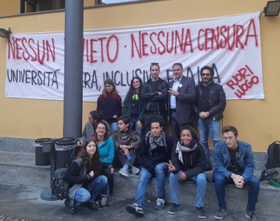 GLI STUDENTI DELL’UNIVERSITÀ DI MILANO RESISTONO AL TENTATIVO, DEI SIONISTI ITALIANI, DI CENSURARE LA CONFERENZA SULLA PALESTINA DI MIKO PELED