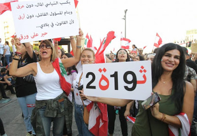 «Les forces communautaires et les USA s’emploient à récupérer le hirak libanais» Interview d’Ali Nassar, chercheur et journaliste